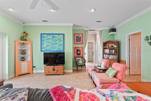 living area with tile patterned floors, crown molding, and visible vents