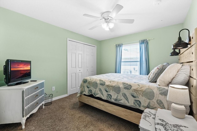 bedroom with carpet floors, a closet, baseboards, and a ceiling fan