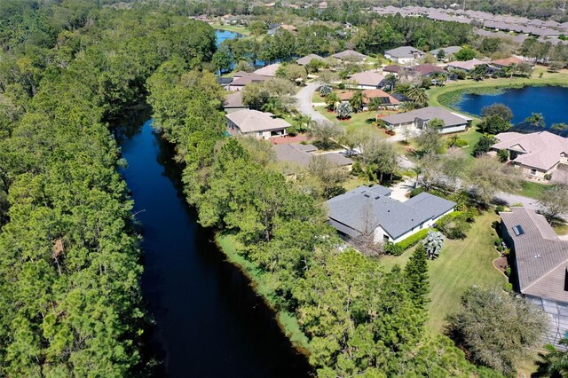 aerial view with a residential view and a water view