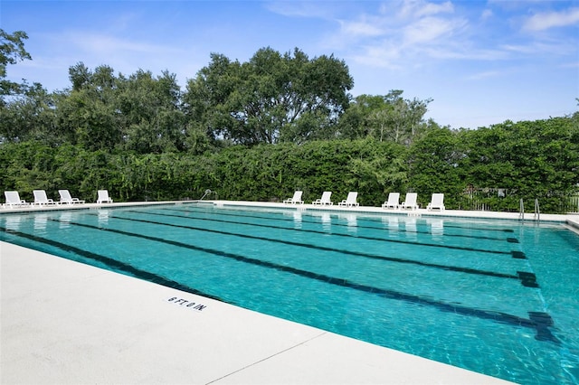 pool with a patio area