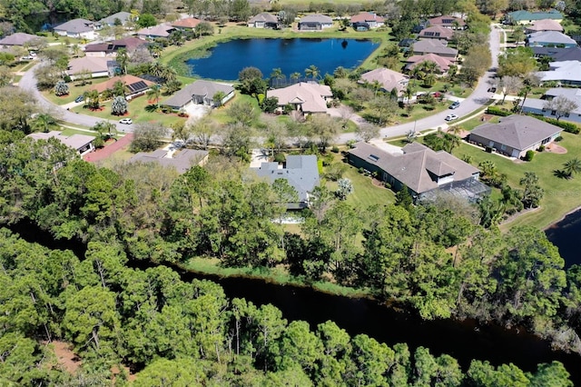 aerial view featuring a residential view and a water view