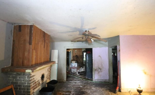 living room with a ceiling fan