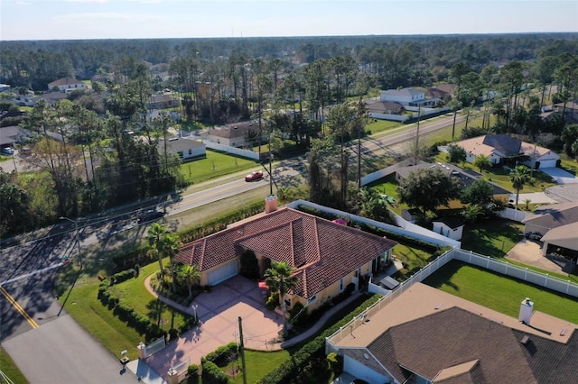 birds eye view of property with a residential view