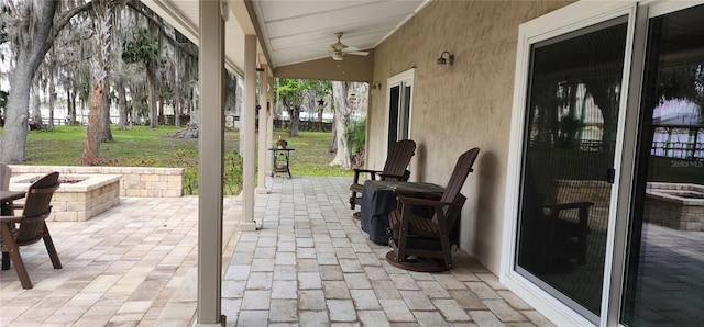 view of patio / terrace featuring ceiling fan