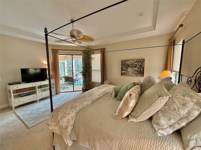 carpeted bedroom featuring access to outside, ornamental molding, a ceiling fan, and baseboards