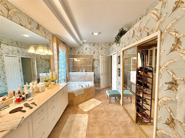 full bath featuring wallpapered walls, a garden tub, a closet, and vanity