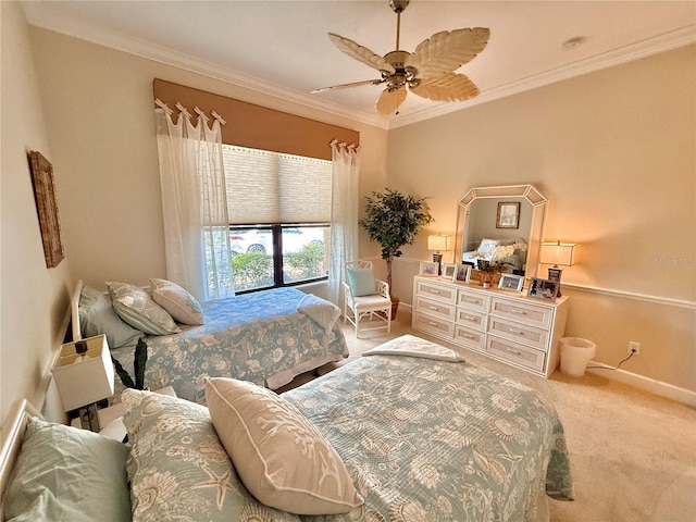 bedroom with carpet, crown molding, and baseboards