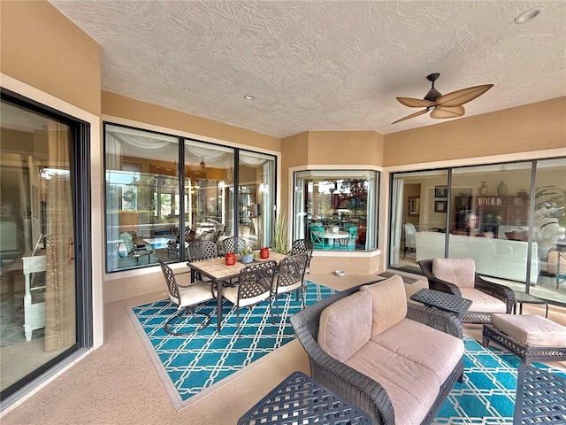 view of patio / terrace featuring ceiling fan and outdoor lounge area