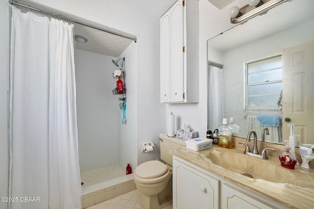 bathroom featuring a shower with shower curtain, vanity, and toilet