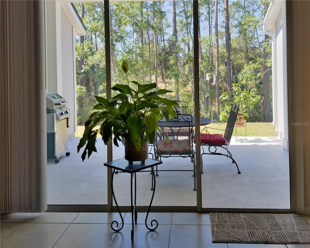 sunroom / solarium featuring plenty of natural light