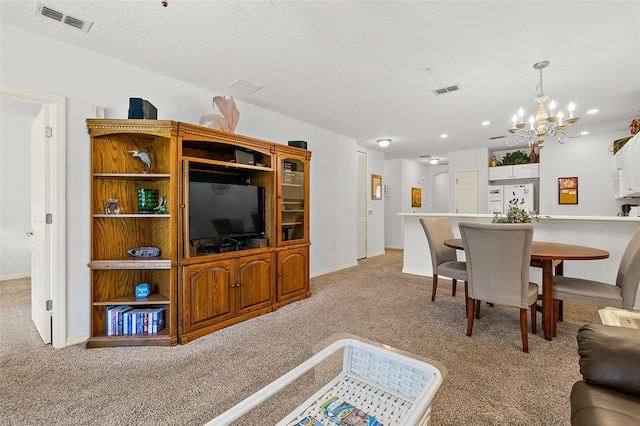 living room featuring light carpet, baseboards, and visible vents