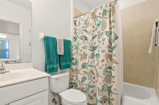 full bathroom featuring toilet, ceiling fan, shower / bath combo, and vanity