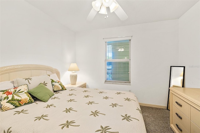 bedroom featuring carpet, baseboards, and a ceiling fan