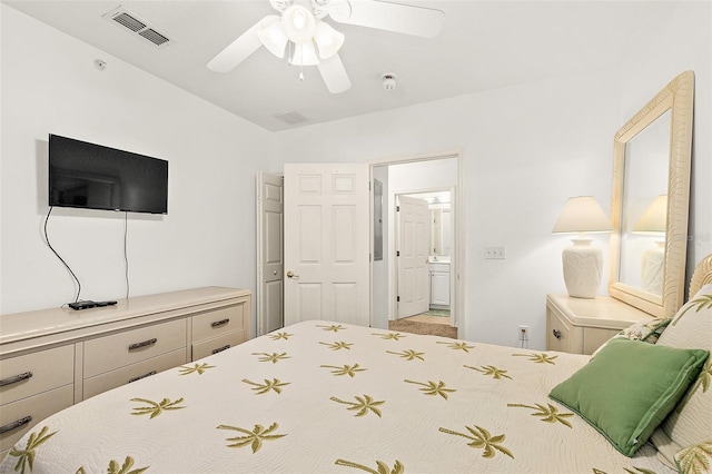 bedroom with lofted ceiling, visible vents, ceiling fan, and ensuite bath