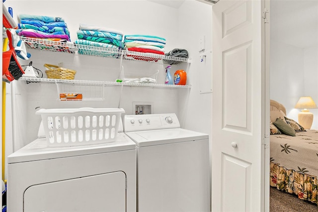 laundry room with washing machine and dryer and laundry area