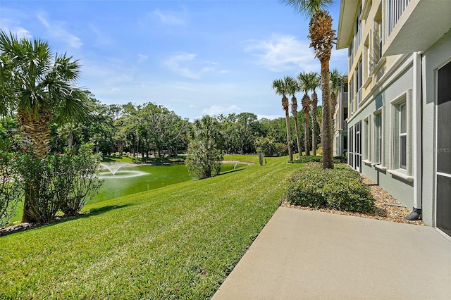 view of yard with a water view