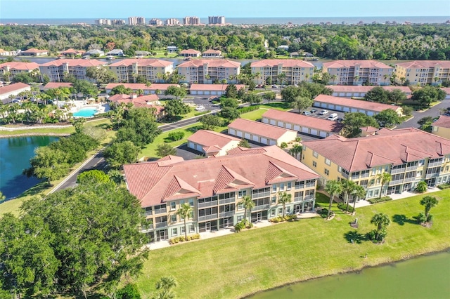 bird's eye view with a water view