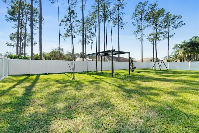 view of yard featuring a fenced backyard