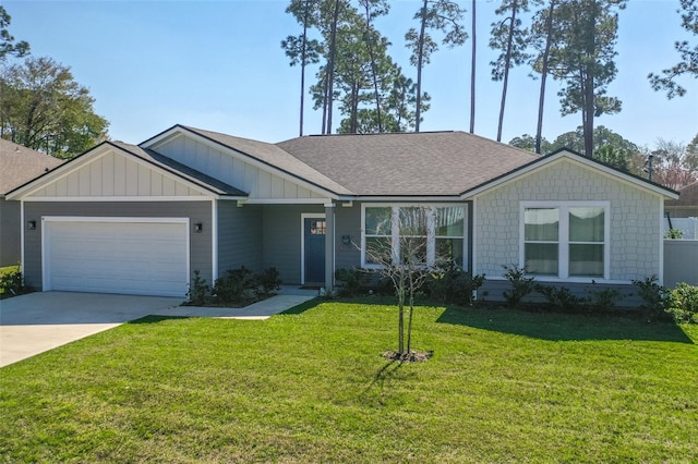 ranch-style house featuring a shingled roof, concrete driveway, an attached garage, board and batten siding, and a front yard