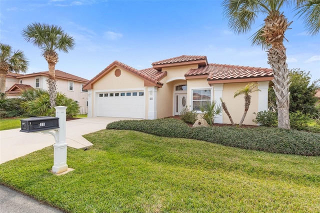 mediterranean / spanish-style house featuring a garage, a tile roof, driveway, stucco siding, and a front lawn