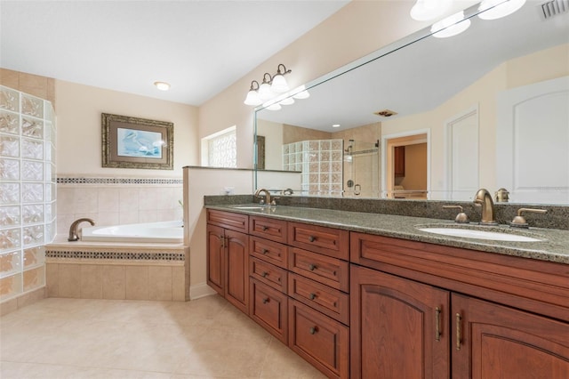 bathroom with visible vents, a stall shower, a sink, a bath, and tile patterned floors