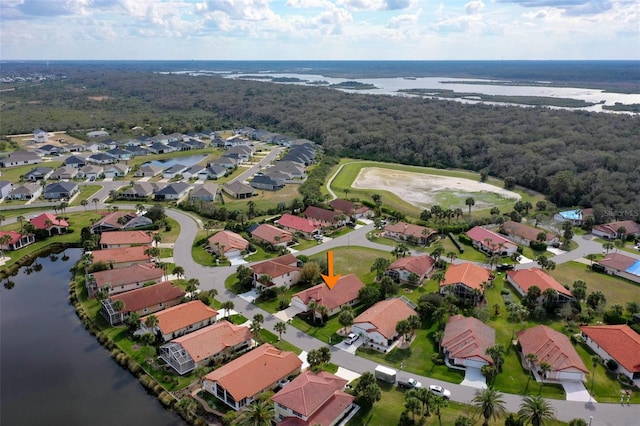 aerial view with a water view and a residential view