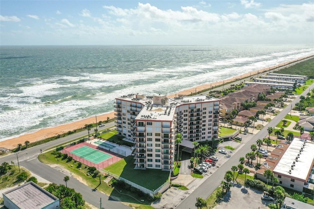 bird's eye view with a view of the beach and a water view