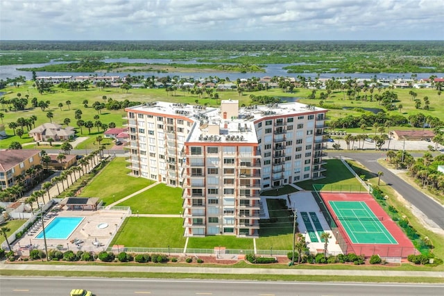 birds eye view of property with a water view