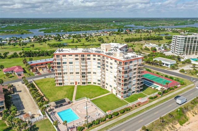 birds eye view of property featuring a water view