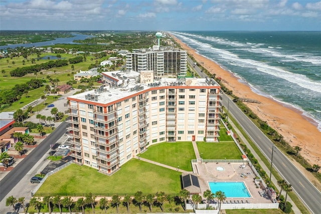 bird's eye view with a beach view and a water view