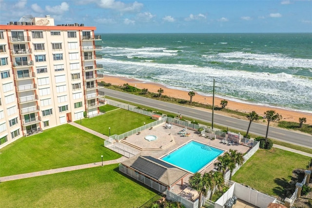 aerial view with a beach view and a water view