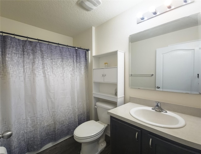 full bath with visible vents, toilet, a textured ceiling, vanity, and a shower with curtain