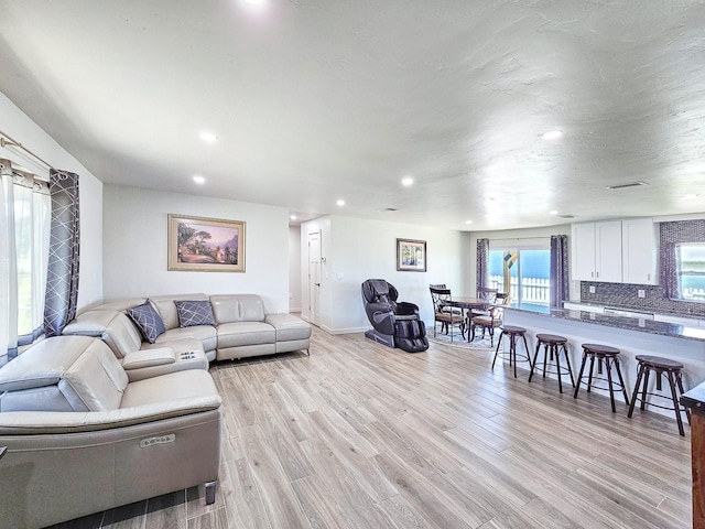 364 Palm Cir, Flagler Beach, FL 32136 - living area with recessed lighting, baseboards, visible vents, and light wood finished floors