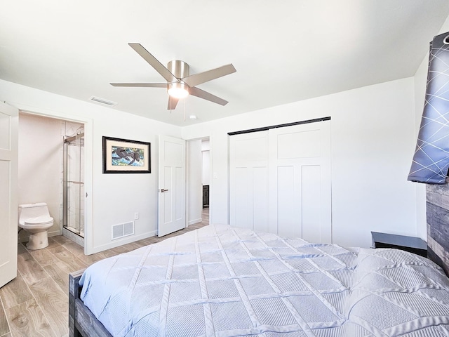 364 Palm Cir, Flagler Beach, FL 32136 - bedroom with a closet, visible vents, ceiling fan, and light wood finished floors