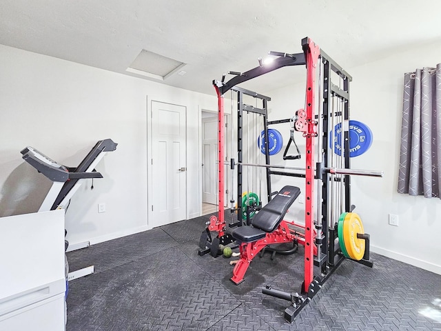 364 Palm Cir, Flagler Beach, FL 32136 - exercise area featuring attic access and baseboards