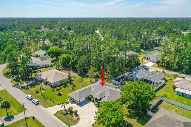 33 Poinsettia Ln, Palm Coast, FL 32164 - aerial perspective of suburban area with a forest