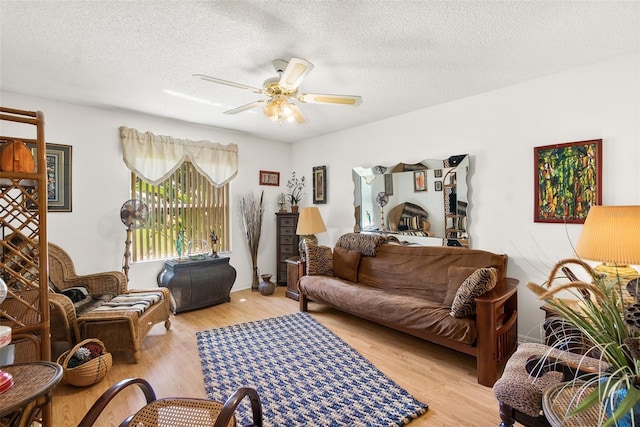 33 Poinsettia Ln, Palm Coast, FL 32164 - living area featuring a ceiling fan, wood finished floors, and a textured ceiling