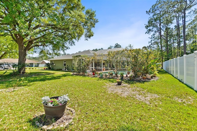 33 Poinsettia Ln, Palm Coast, FL 32164 - view of yard featuring glass enclosure