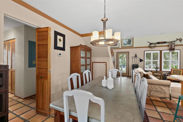 dining area with a notable chandelier