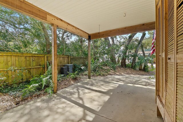 view of patio / terrace featuring fence