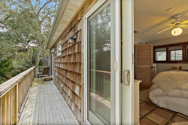 balcony featuring a ceiling fan