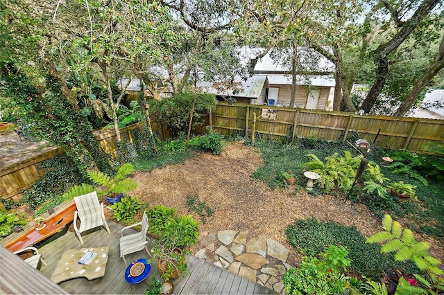 view of yard with a fenced backyard