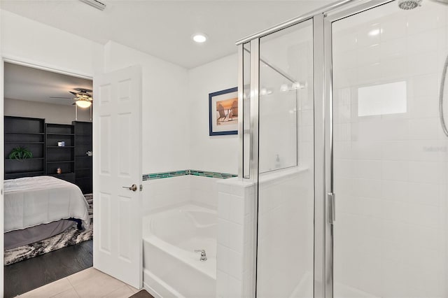 full bath with tile patterned floors, ensuite bathroom, a shower stall, a bath, and recessed lighting