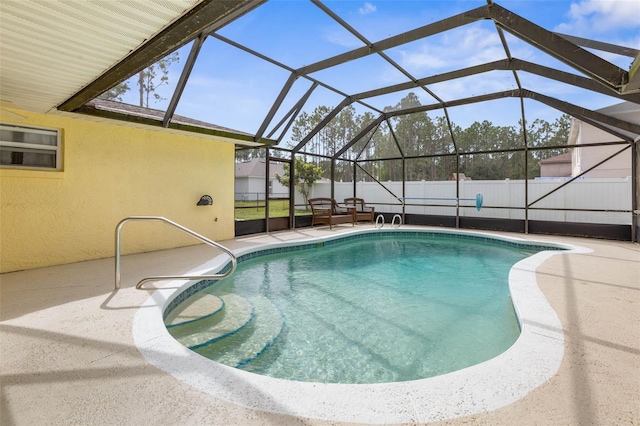 view of pool with a patio, a fenced backyard, a fenced in pool, and a lanai