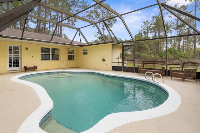 pool with glass enclosure, a patio area, and an outdoor living space