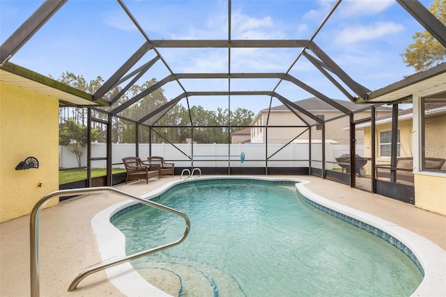 view of pool featuring a fenced in pool, a lanai, a fenced backyard, and a patio