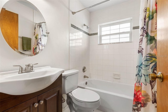 bathroom with vanity, toilet, and shower / bathtub combination with curtain