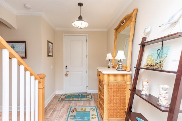 entryway with stairway, crown molding, light wood-type flooring, and baseboards