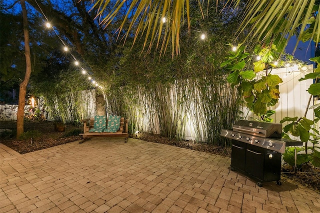 view of patio / terrace featuring fence