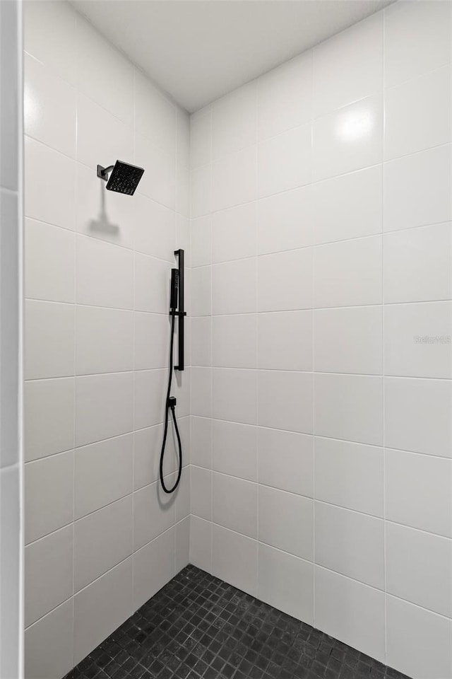 interior space with a tile shower